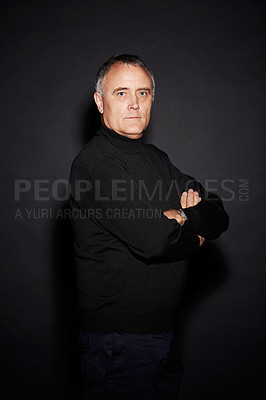 Buy stock photo Serious portrait of mature man in studio with arms crossed, confidence and dark fashion style. Pride, relax and senior person isolated on black background with expert knowledge, mystery and wisdom.