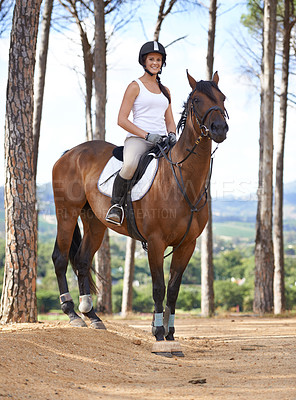 Buy stock photo Portrait, horse riding or happy woman in nature countryside with rider or jockey for recreation or adventure. Smile, relax or athlete with a pet animal for training, exercise or wellness in forest