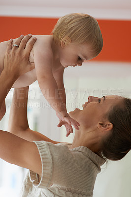 Buy stock photo Baby, mother and playing in home for wellness with nurture, relationship and bonding for happiness. Family, child or toddler and embrace with early childhood, parenting and smile in living room