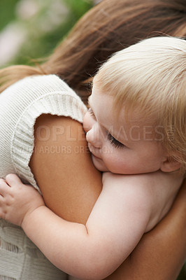 Buy stock photo Hug, closeup and mom with baby outdoor with love and support together in backyard. Infant, kid and mother  bonding in embrace with care, kindness and trust in garden, park or green environment