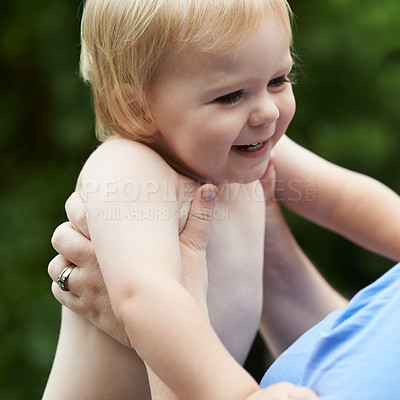 Buy stock photo Baby, mom and playing outdoor for development with nurture, relationship and bonding for happiness. Family, child or toddler and hands with early childhood, parenting and love at park in nature