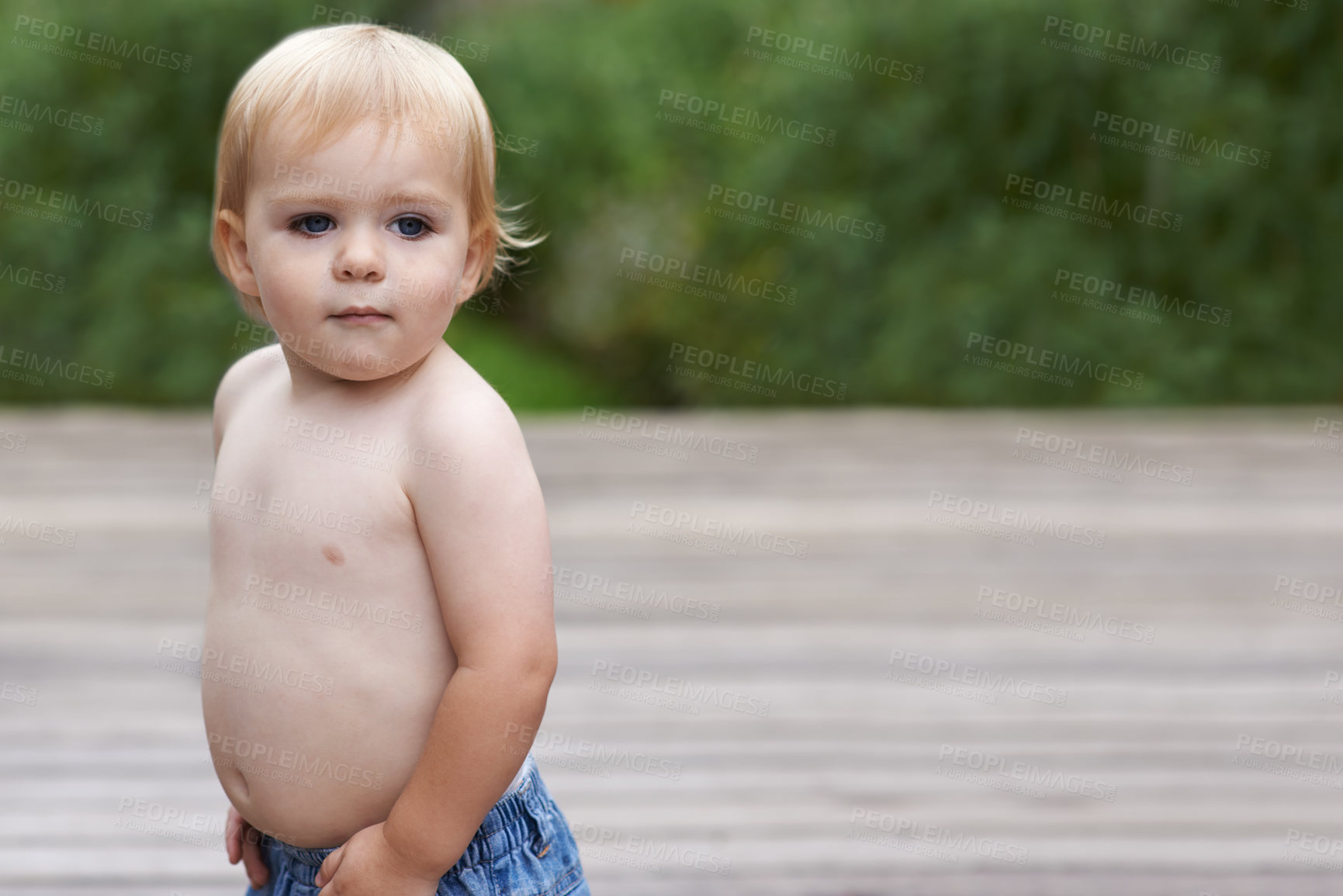 Buy stock photo Baby, playing on porch outdoor for development with mockup, curiosity or early childhood in backyard of home. Toddler, child and relax in garden for wellness, milestone and exploring or innocent