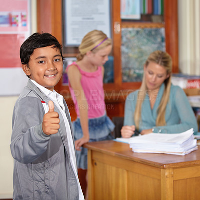 Buy stock photo Portrait, child and student with thumbs up, smile and success in classroom. Happiness, hand gesture and kid with like emoji, agreement and approval for learning in elementary school for education.
