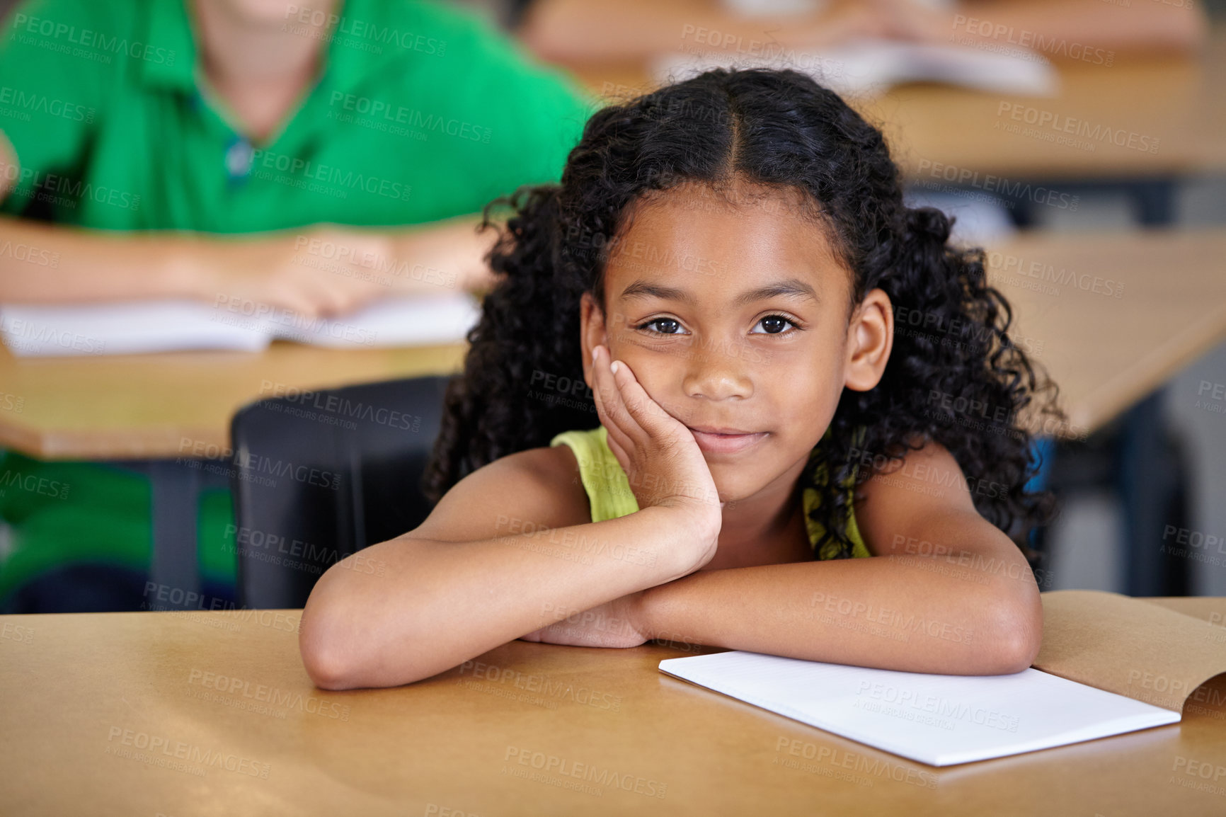 Buy stock photo Portrait, kid and bored student in classroom with book, ready to learn and study in class. Boredom, education and serious Indian girl learning in primary school for knowledge, development or studying