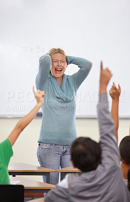 Buy stock photo Angry teacher, classroom and shout at kids with raised hand for questions, answer or pop quiz with stress. Teaching woman, children and education with frustrated face, talking and anxiety at school