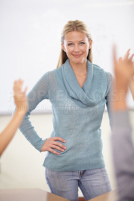 Buy stock photo Hands in the air, portrait and teacher with students, education and knowledge in a classroom. Woman, educator and kids with questions, answers and child development with a smile, learning and school