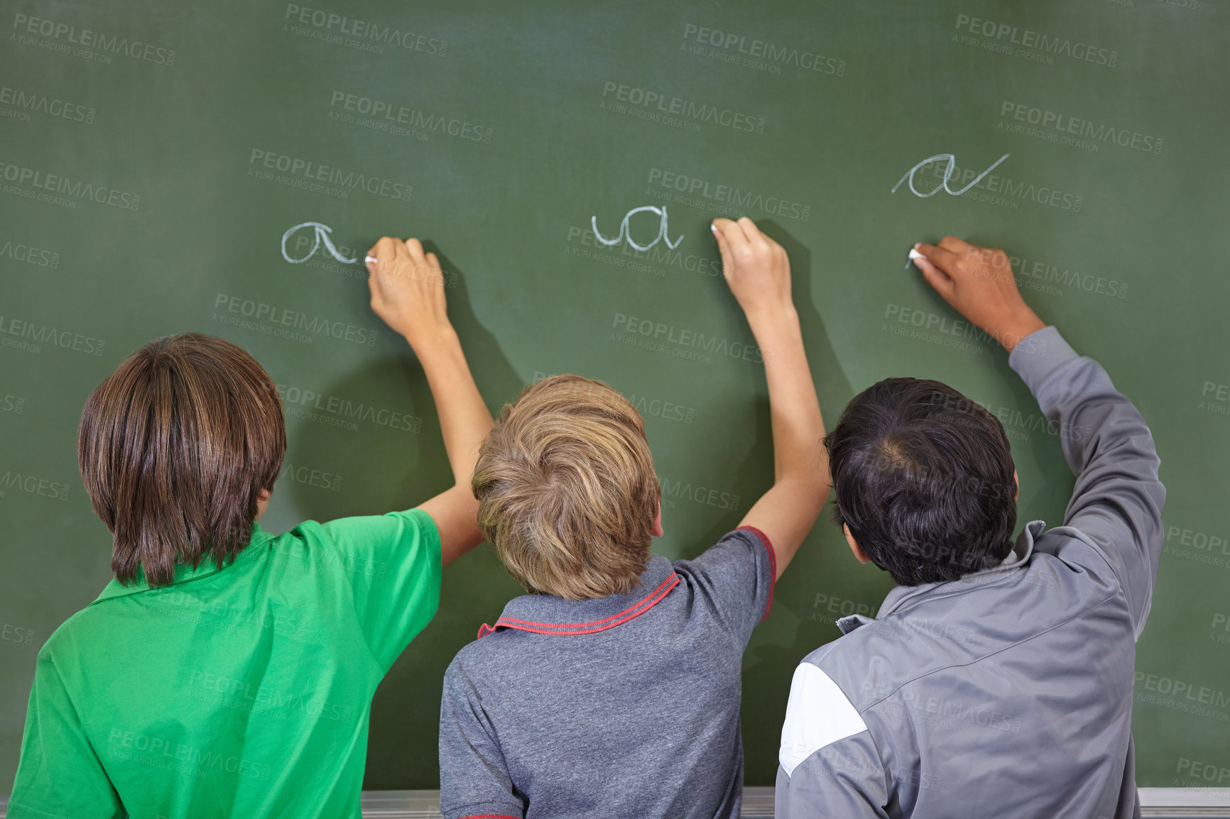 Buy stock photo Children, chalkboard and school writing with education, cursive and answer for learning. Back, knowledge and youth development in a study lesson with students in classroom with chalk and solution