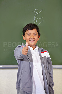 Buy stock photo Portrait, child and thumbs up of student on chalkboard in classroom, elementary school and mockup. Blackboard, education and kid with hand gesture for like emoji, agreement and learning with a smile.