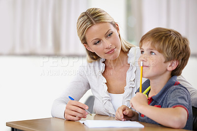 Buy stock photo A young teacher in her classroom