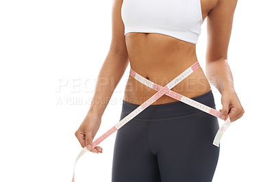 Buy stock photo Woman, lose weight and hands with measuring tape closeup in studio or white background. Fitness, check and person reading measurement and size of body for health, wellness and progress in goals