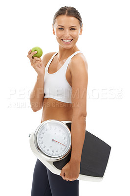 Buy stock photo Studio portrait, apple or happy woman with scale to track weight loss progress, nutrition or body goals. Fruit, vegan lifestyle or nutritionist smile for slimming, diet or fitness on white background