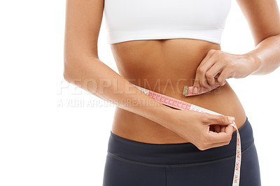 Buy stock photo Woman, hands and measuring tape closeup to lose weight in studio or white background. Fitness, check and person with measurement results and size of body for health, wellness and progress in goals