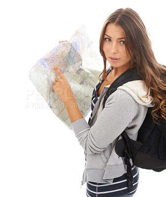 Buy stock photo Map, portrait and woman reading in studio for hiking adventure, weekend trip or vacation. Travel, discover and young female person with paper directions for tourism and navigation by white background