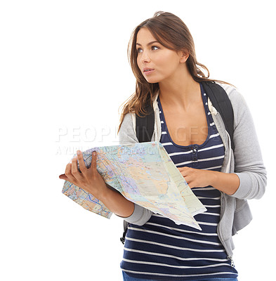 Buy stock photo Map, guide and woman reading in studio for hiking adventure, weekend trip or vacation. Travel, discover and young female person with paper directions for tourism and navigation by white background.