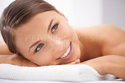 Buy stock photo Relax, smile and young woman at spa with body massage for health, wellness and self care. Happy, natural and female person with calm, peaceful and serene skin therapy treatment at beauty salon.