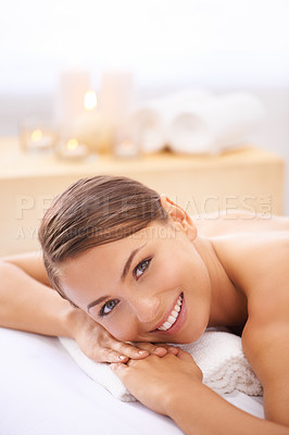 Buy stock photo Relax, happy and portrait of woman at spa with body massage for health, wellness and self care. Smile, natural and female person with calm, peaceful and serene skin therapy treatment at beauty salon.