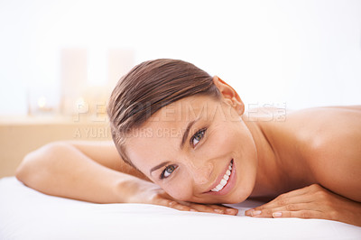 Buy stock photo Relax, self care and young woman at spa with body massage for health, wellness and pamper. Happy, natural and female person with calm, peaceful and serene skin therapy treatment at beauty salon.