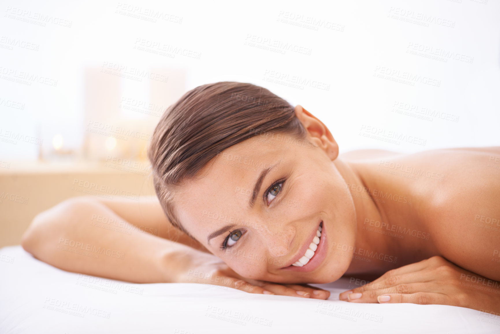 Buy stock photo Relax, self care and young woman at spa with body massage for health, wellness and pamper. Happy, natural and female person with calm, peaceful and serene skin therapy treatment at beauty salon.