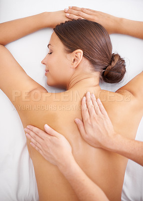 Buy stock photo Top view of a beautiful young woman receiving a calming massage