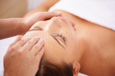 Buy stock photo Woman, spa and forehead massage on face for beauty, holistic therapy and healing at cosmetics salon. Calm client relax at wellness resort for facial reiki, acupressure and peaceful skincare treatment