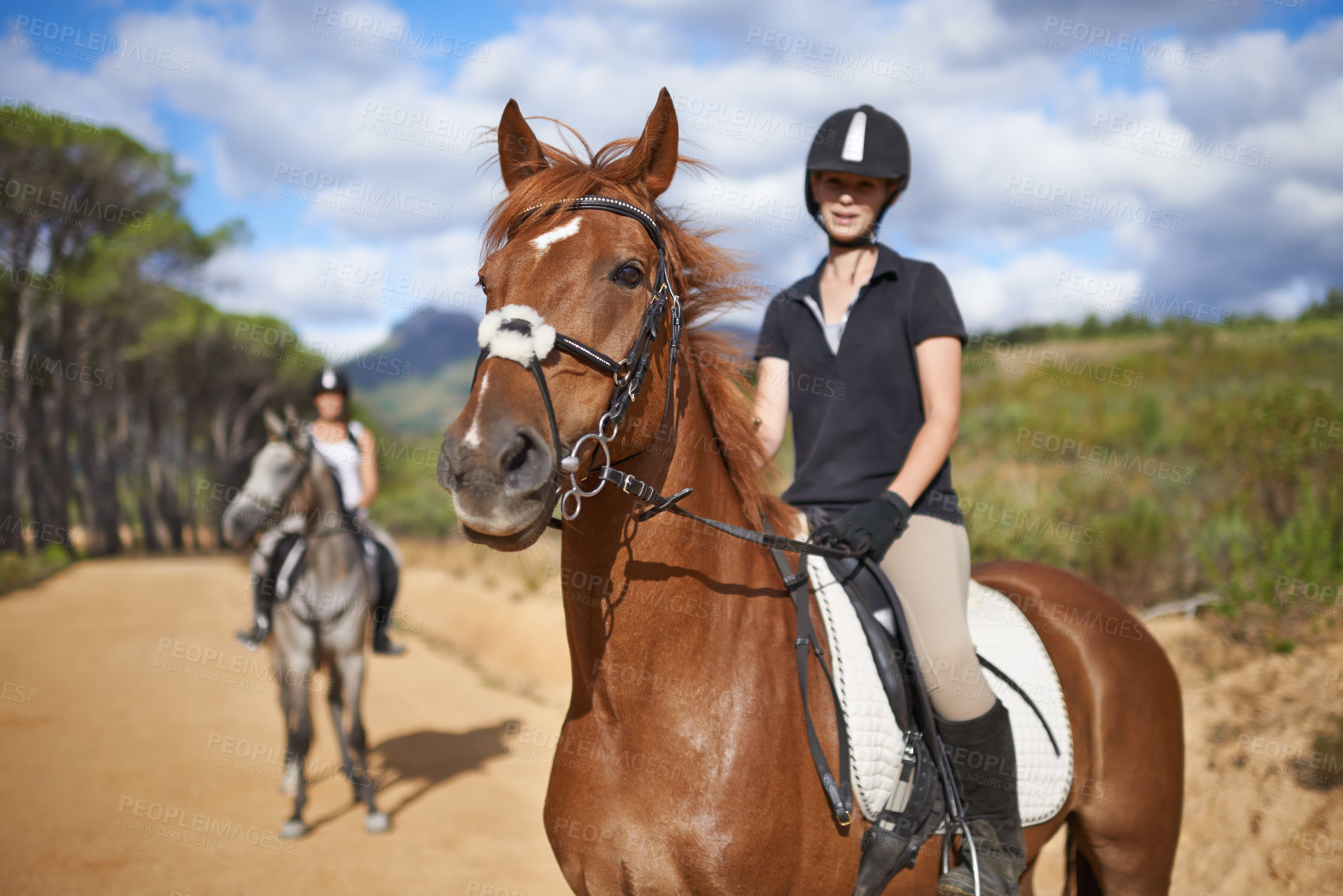 Buy stock photo Woman, horse and countryside for horseback riding in texas, rider and sport training for performance. Farm, rural and nature in outdoor, adventure and animal in gravel, pet care and dirt road
