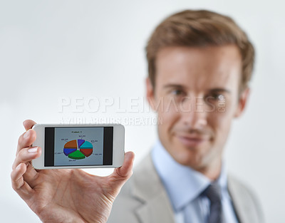 Buy stock photo Business man, phone screen and pie chart, data or statistics for financial report, revenue and stock market. Portrait of corporate accountant on mobile for trading or sales on a white wall background