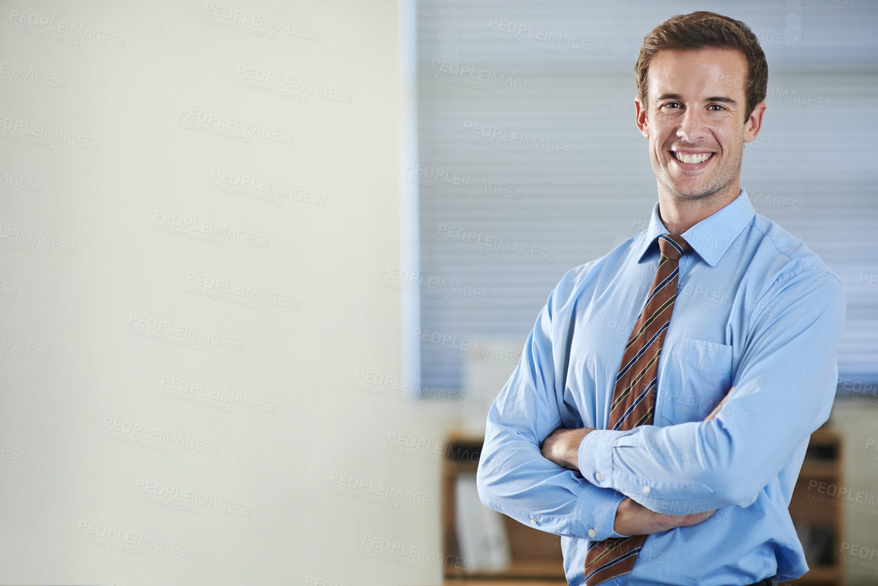 Buy stock photo Portrait, happy and business man with arms crossed, pride in corporate career and mockup space in office. Face, confident professional consultant and entrepreneur working at a company in Australia
