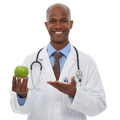 Buy stock photo Portrait, doctor and happy black man with apple for fruit diet, healthcare nutrition or vitamin c benefits. Studio, vegan food and African nurse smile for health recommendation on white background