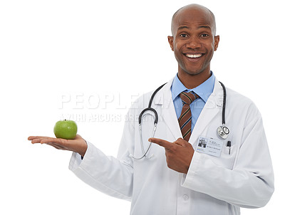 Buy stock photo Portrait, black man and doctor point at apple presentation for weight loss diet, nutrition or antioxidants benefits. Studio food, palm and African dietician with fresh fruits on white background