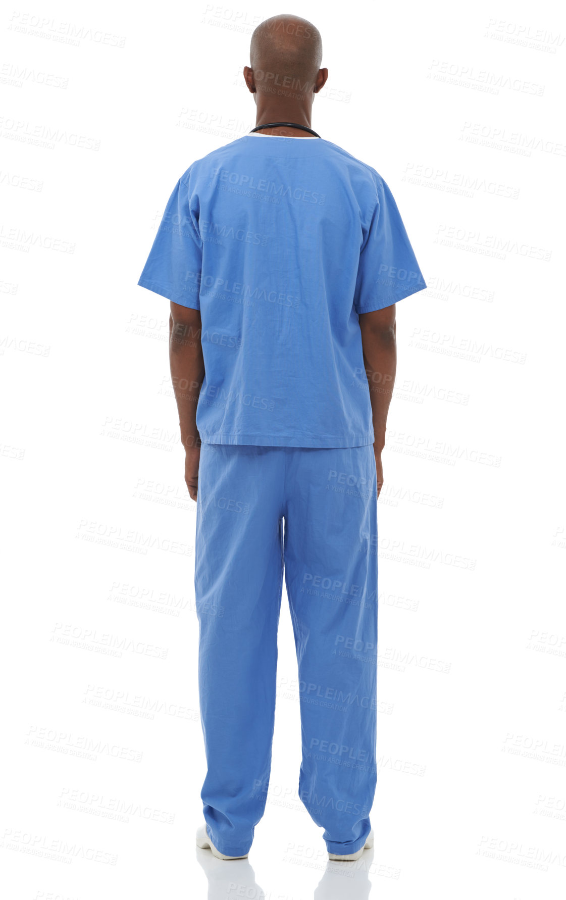 Buy stock photo Studio shot of a young african doctor with his back facing the camera