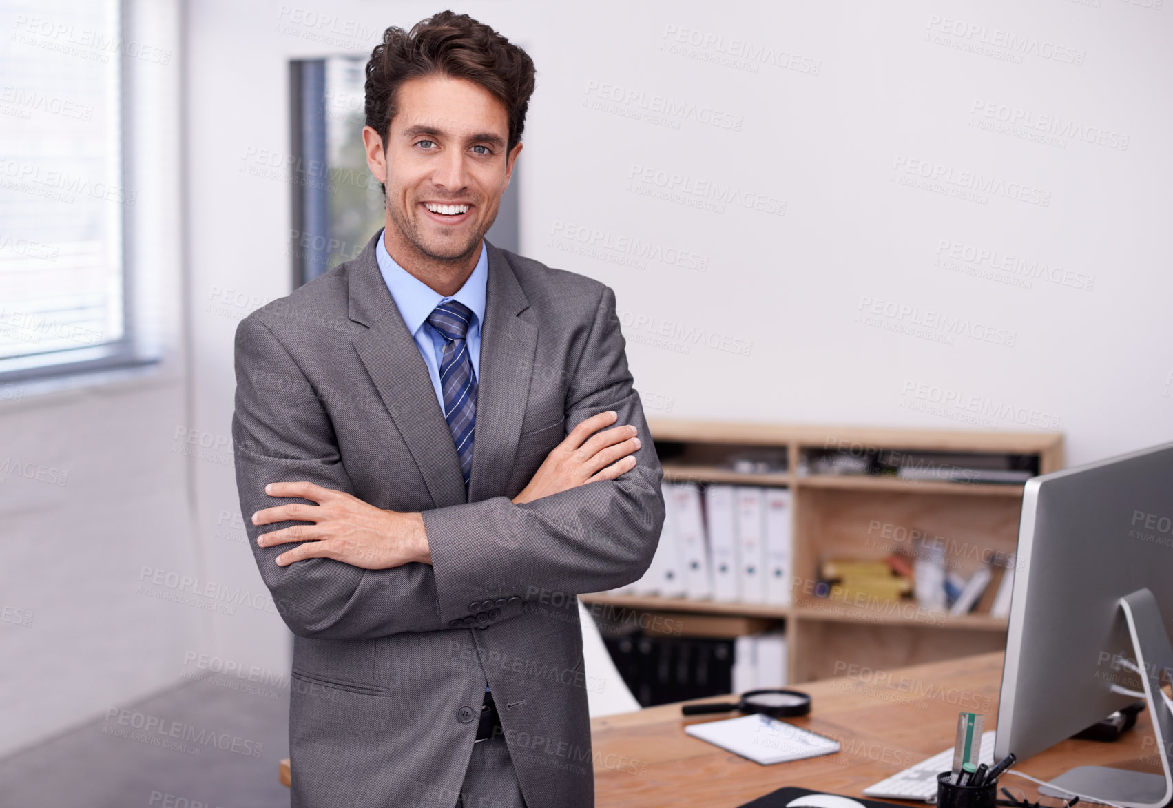 Buy stock photo Portrait of confident businessman at desk with smile, arms crossed and career in legal inspection at law firm. Happy attorney, lawyer or business man with office job as quality assurance professional