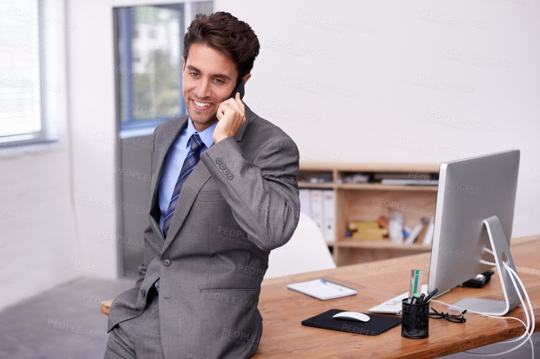 Buy stock photo Businessman, thinking and phone call in office by desk, communication and desktop on table in corporate career. Professional, person and planning on mobile, technology and networking in formal suit