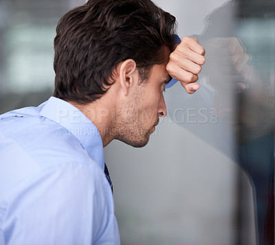 Buy stock photo Depression, business man and head on glass wall for financial crisis, reflection or anxiety for fail. Stress, frustrated and a tired professional in bankruptcy, debt and worry for office mistake