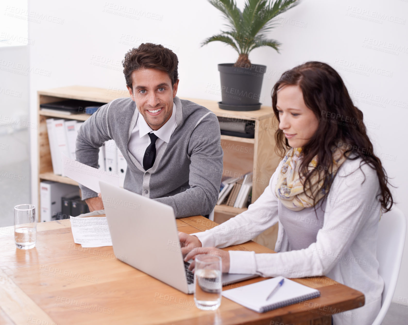 Buy stock photo Business people, teamwork and planning on computer in office for human resources and employees management. Portrait of manager, man and woman working on laptop for collaboration, helping or feedback