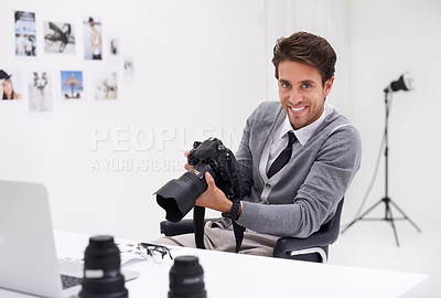 Buy stock photo Man, editor and photography in office with portrait, checking image design and creativity in workplace. Person, smile on face and glasses for production in technology and digital photoshoot in agency