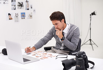 Buy stock photo Photographer, thinking and editing in office with computer to process, production and catelog images. Professional, editor and creative person with laptop and photoshoot results of cinematography