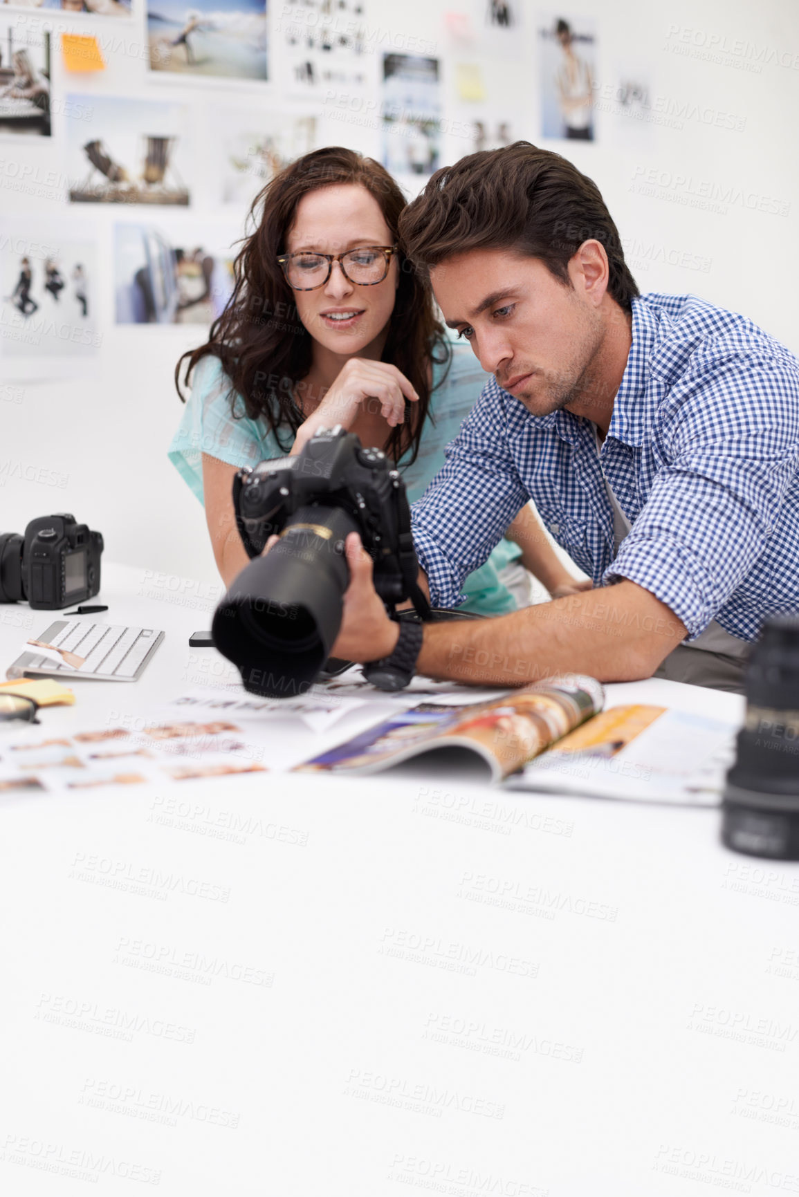 Buy stock photo Camera, studio and photographers team editor in an office or workshop for production. Creative, photography and young artists with dslr equipment for editing pictures inspection in modern workplace.