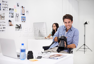 Buy stock photo Man, camera and stock photography in portrait, checking image design and creative in workplace. Person, smile face or happy in production career, technology or focus in office with digital graphic