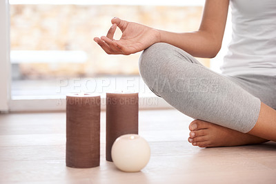 Buy stock photo Woman, hands and meditation by candles for zen, exercise or yoga in spiritual wellness or inner peace at home. Closeup of calm female person or yogi meditating in relax for awareness or mental health