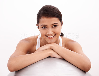 Buy stock photo Studio, portrait and girl with gym ball, smile and exercise for health, wellness and training. Workout, pilates and happy woman with equipment for balance, fitness and body care on white background.