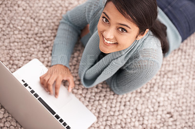 Buy stock photo Portrait of happy woman on carpet with laptop, relax and smile with studying, research or browse on web from above. Face of student girl on floor with computer, elearning and online education in home