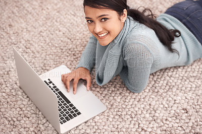 Buy stock photo Portrait of happy woman on carpet with laptop, relax and browse with studying, research and web in living room. University student girl on floor with computer, elearning and online education in home.