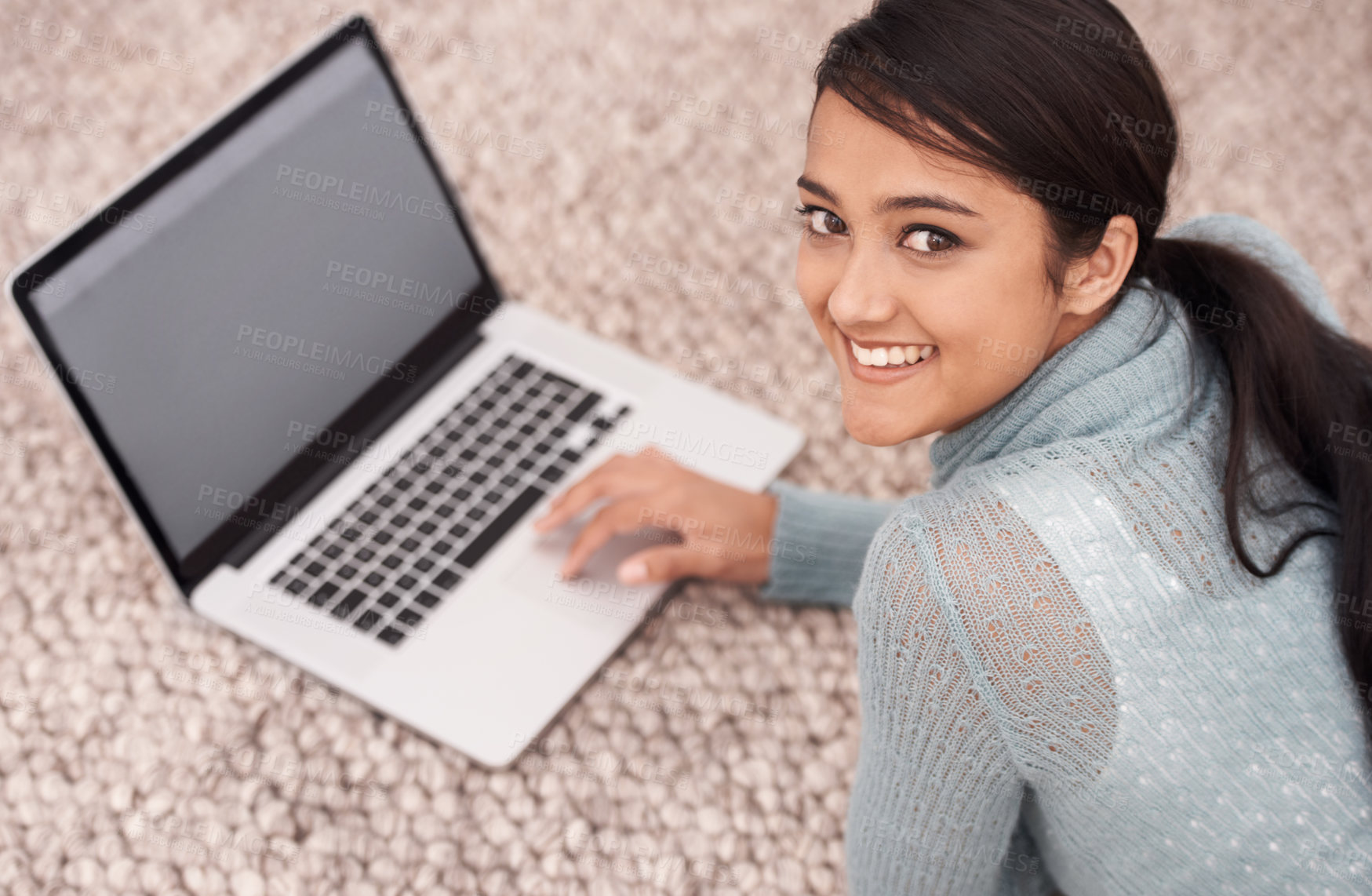 Buy stock photo Portrait of girl on carpet with laptop, smile and relax with studying, research and browse on web in living room. Happy student woman on floor with computer, elearning and online education in home.