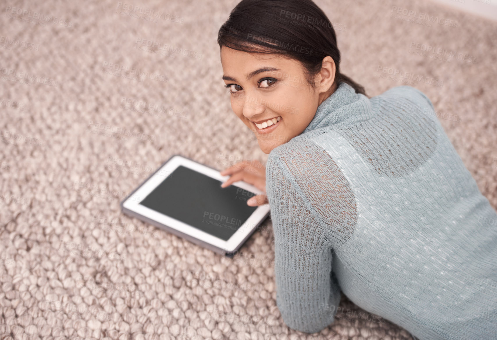 Buy stock photo Happy woman, portrait and tablet on floor for research, communication or streaming at home. Young female person smile with technology in relax for online search, networking or social media on carpet