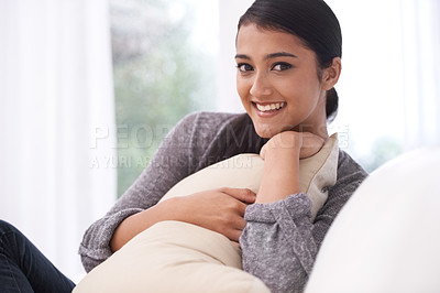 Buy stock photo Relax, woman and sofa pillow with portrait, smile and happy  with rest in the morning at home. Living room, lounge and couch with a female person from India on a break with  peace and calm in house
