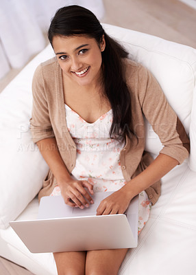 Buy stock photo Portrait of girl on couch with laptop, smile and relax with remote work, website and browse from above. Happy woman on sofa with computer for freelance job, online web research and internet in home.