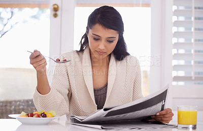Buy stock photo Breakfast, newspaper and woman with fruit salad and juice for nutrition, wellness and diet. Morning, reading news and person with drink, healthy food and snack for detox, vitamins and organic meal