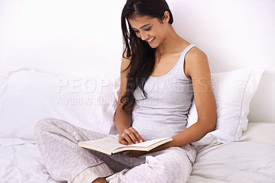 Buy stock photo Woman, literature and relaxing by reading a book in bed, knowledge and fictional novel at home. Happy female person, education and story for learning or fantasy, bedroom and hobby in morning routine