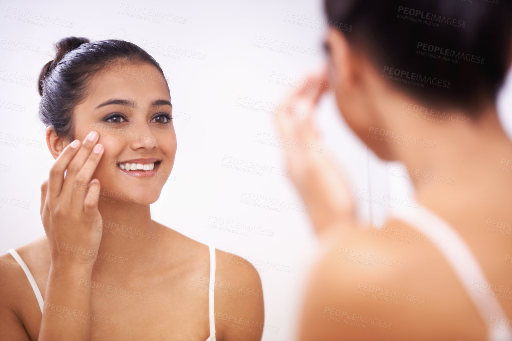 Buy stock photo Happy woman, face and cream in mirror for beauty, cosmetics or makeup in bathroom at home. Female person or model smile applying lotion or moisturizer for facial, skincare or treatment in reflection
