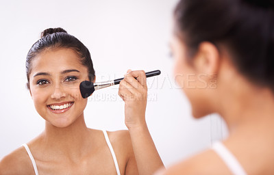 Buy stock photo Happy woman, portrait and makeup brush in mirror for cosmetics, grooming or beauty in bathroom at home. Female person smile or applying foundation, blush or contour for facial treatment in reflection